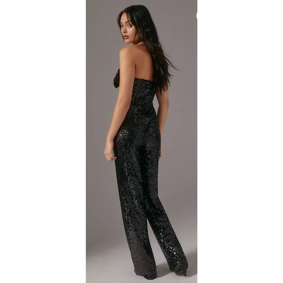 7. Anthropologie Hutch Bow Jumpsuit - Picture 3 of 9